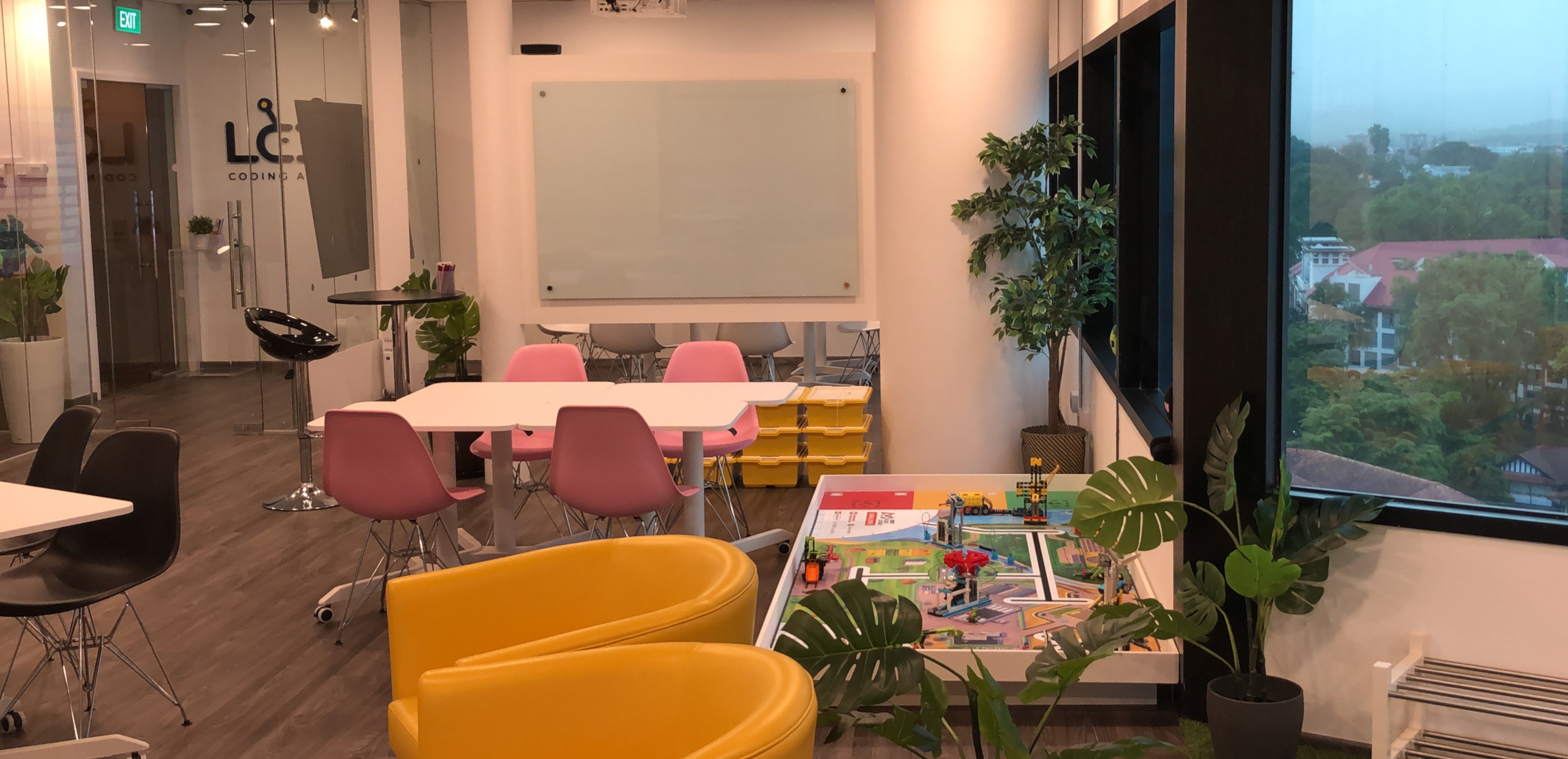 The LCCL learning space at Forum Office Tower, Orchard Road, with the Singapore skyline beyond